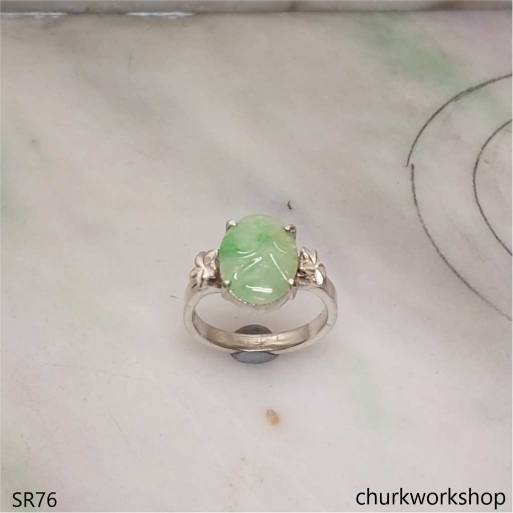 Light green carved jade ring