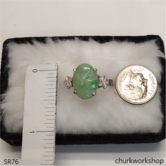 Light green carved jade ring