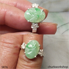 Light green carved jade ring