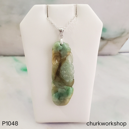Grape vine carved brown and green jade pendant
