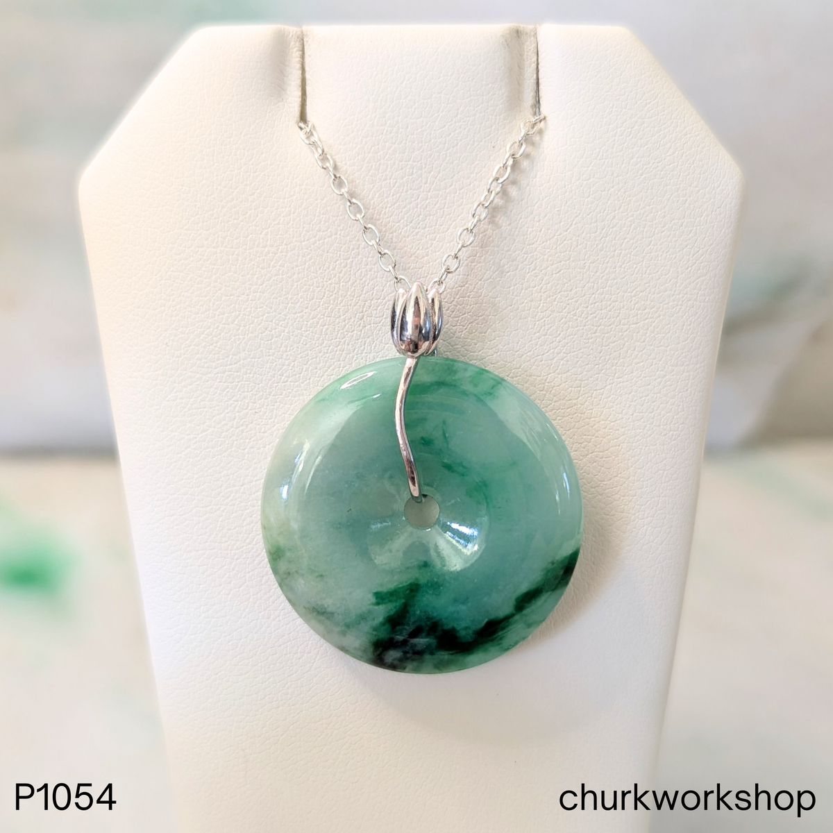 Rich green jade donut pendant