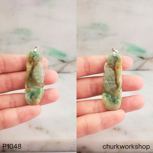 Grape vine carved brown and green jade pendant