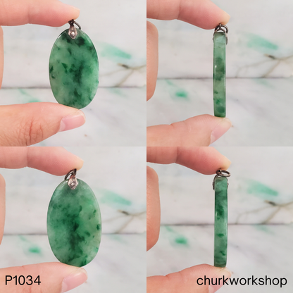 Deep green oval jade pendant