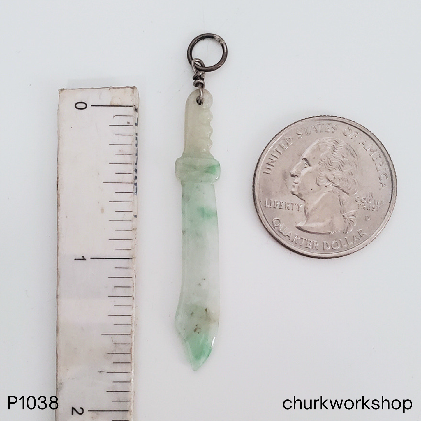 Pale green jade sword pendant
