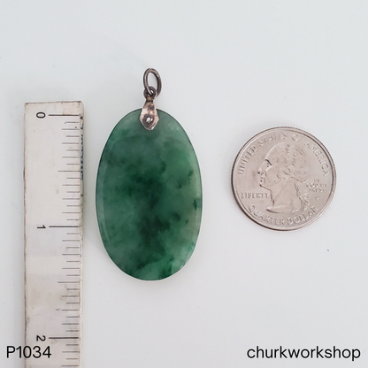 Deep green oval jade pendant