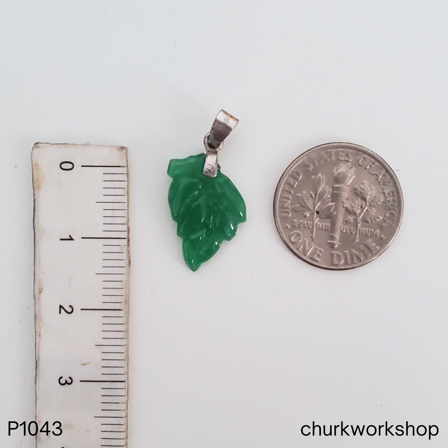 Oily green leaf jade pendant