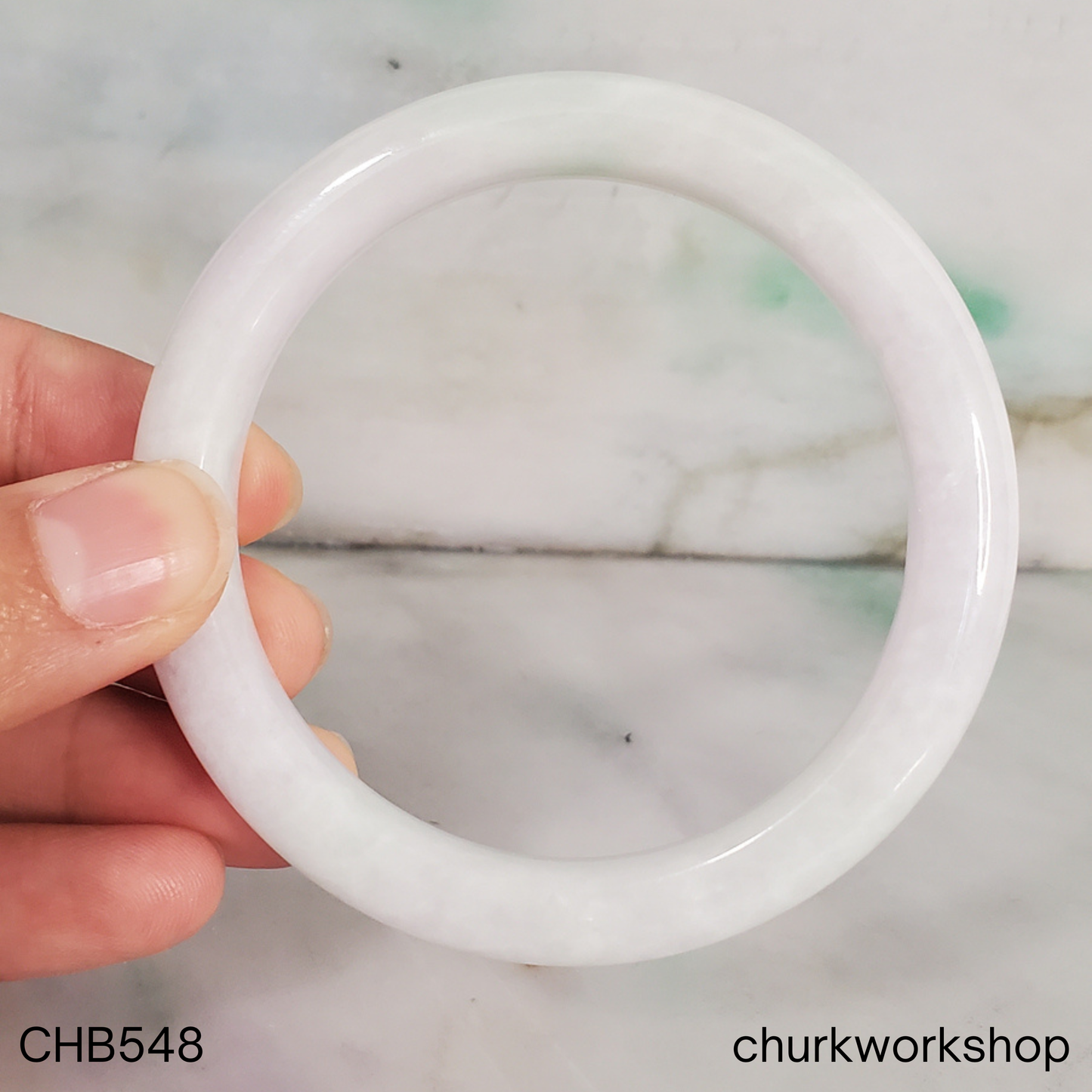 White with pale apple green spot jade bangle