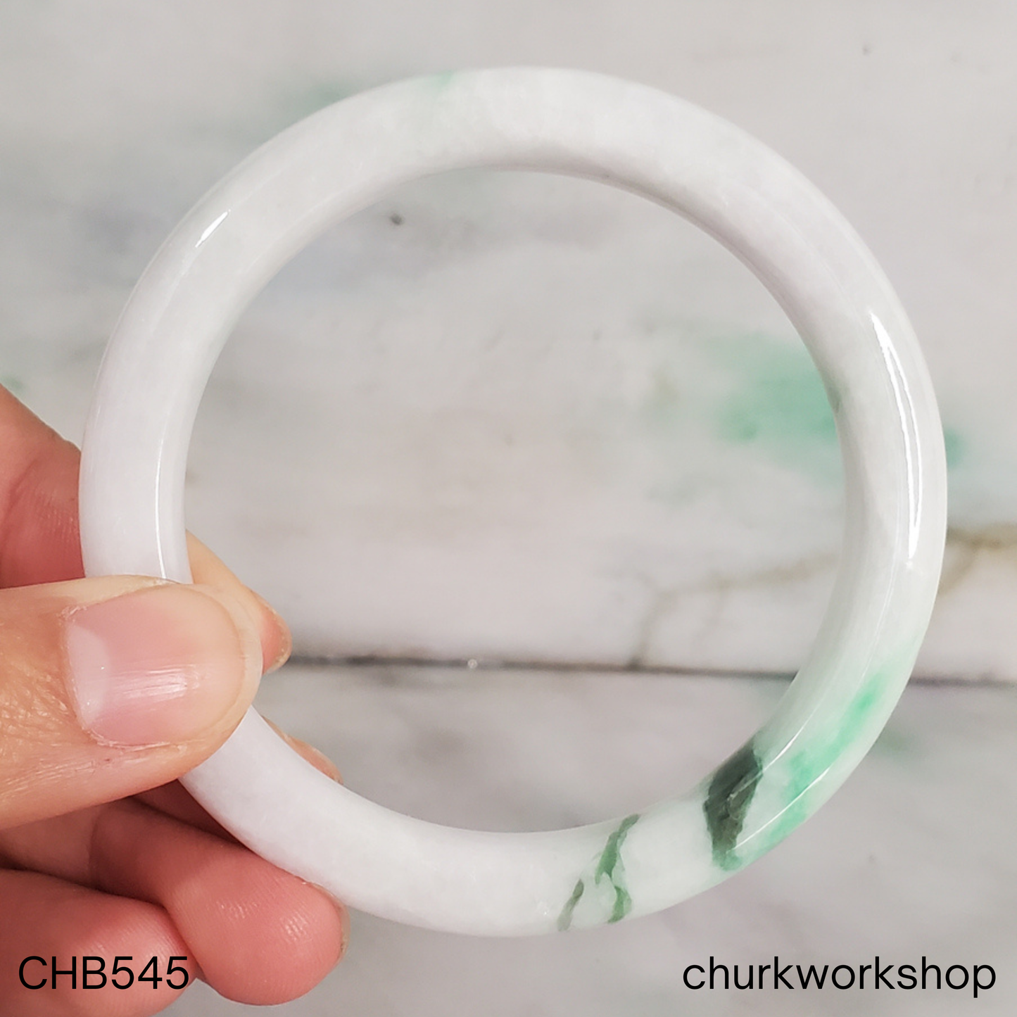 White with splotch of bright apple green and dark green jade bangle