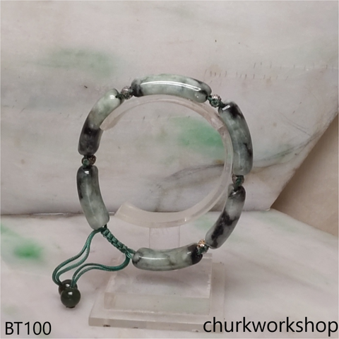 Light green with dark splotches jade bracelet