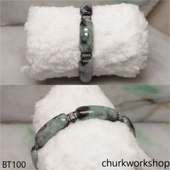 Light green with dark splotches jade bracelet