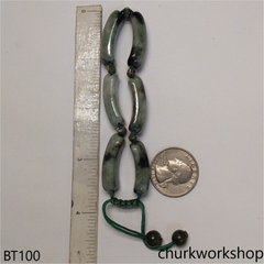 Light green with dark splotches jade bracelet