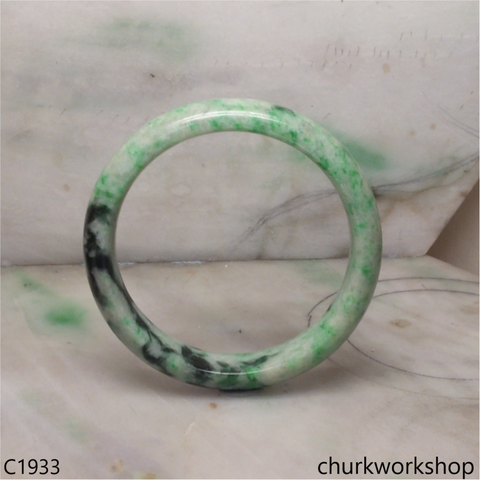 Light base with green splotches  jade bangle