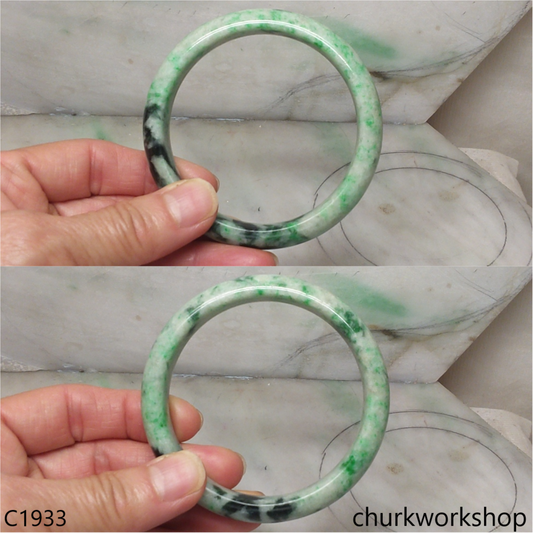 Light base with green splotches  jade bangle