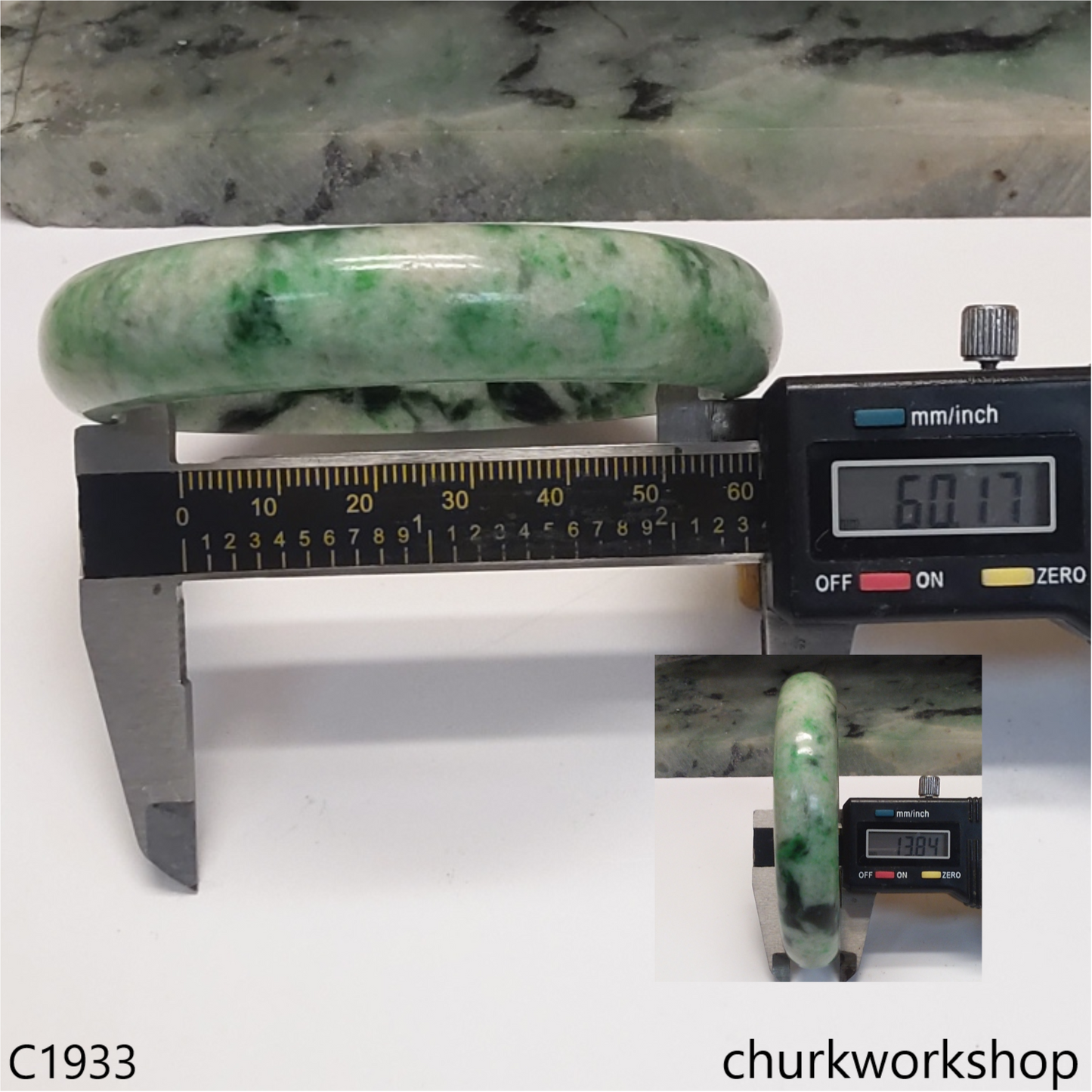 Light base with green splotches  jade bangle