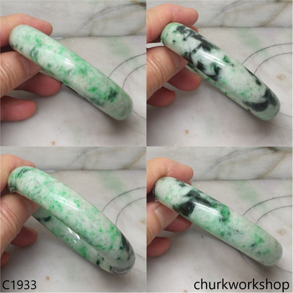 Light base with green splotches  jade bangle