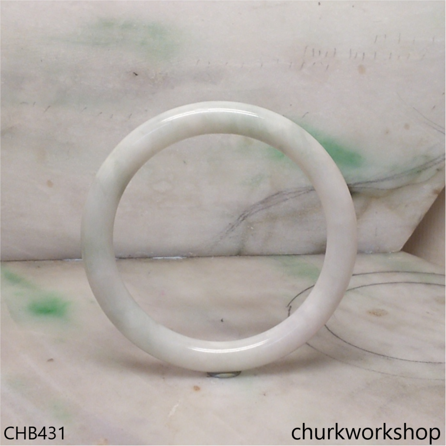 Pale green jade bangle