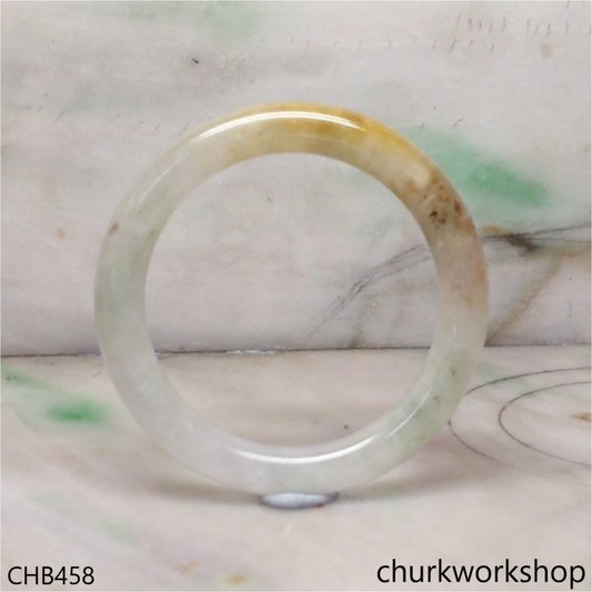Pale green with brownish jade bangle