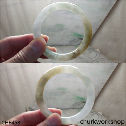 Pale green with brownish jade bangle