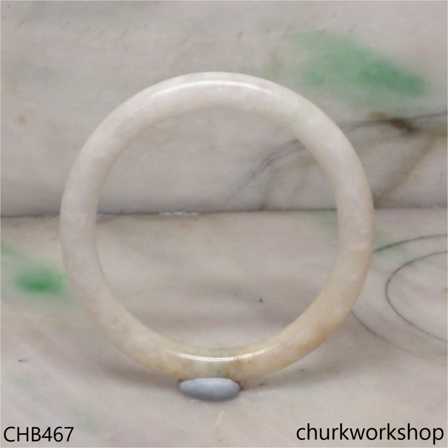 Pale yellowish jade bangle