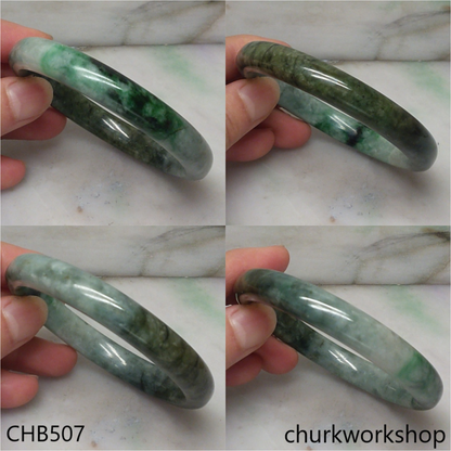 Large grayish base with green splotches jade bangle