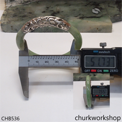 Light green jade bangle with silver wrapping