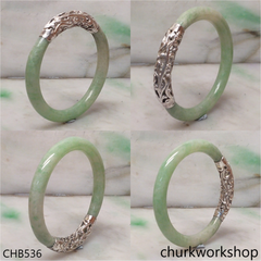 Light green jade bangle with silver wrapping