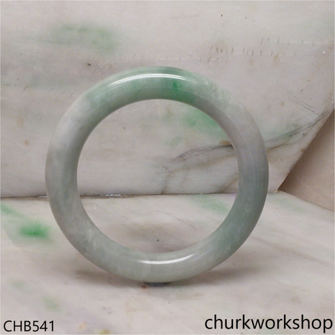 Large light green with splotches green jade bangle