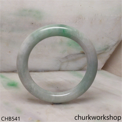 Large light green with splotches green jade bangle