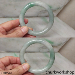 Large light green with splotches green jade bangle