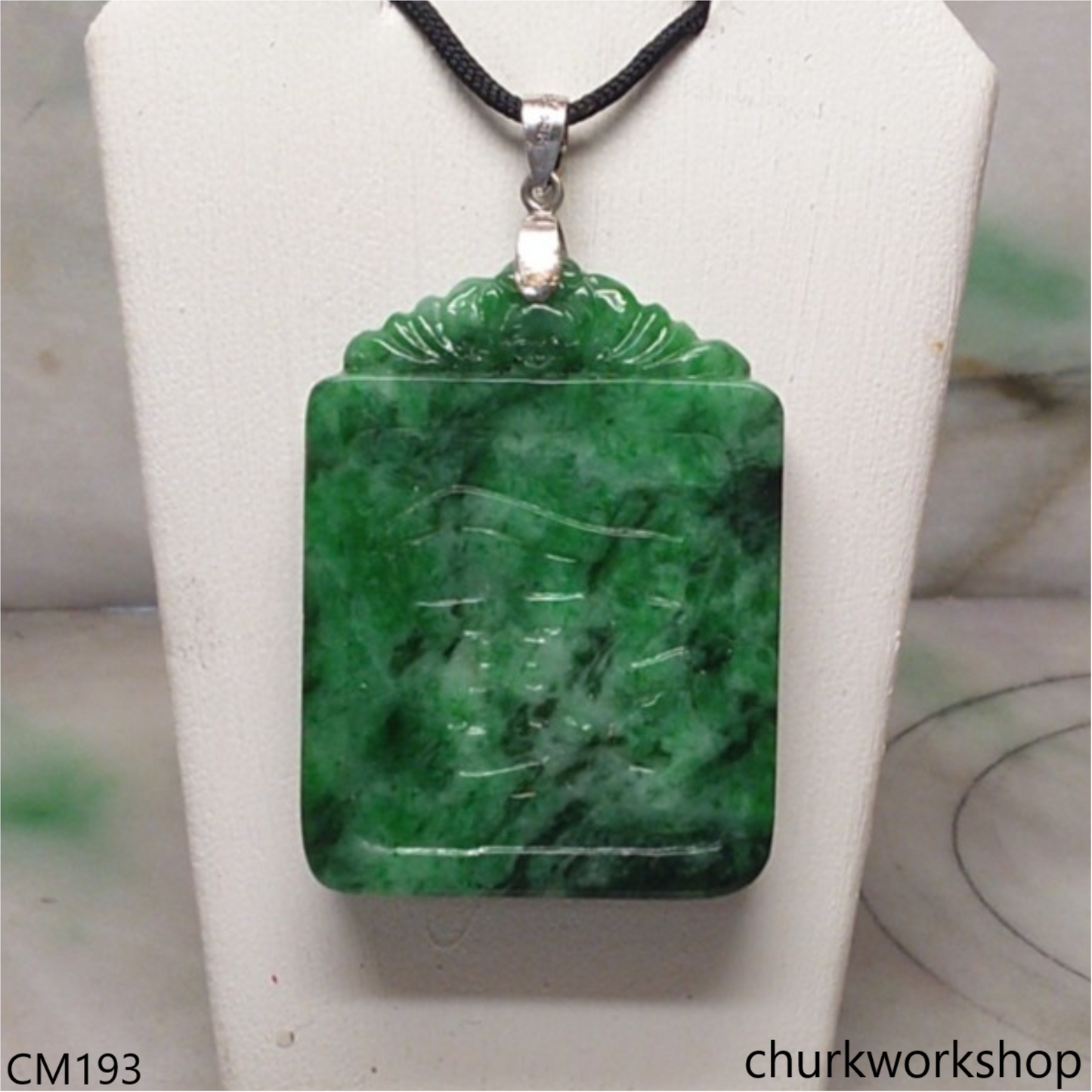 Custom cut green jade pendant