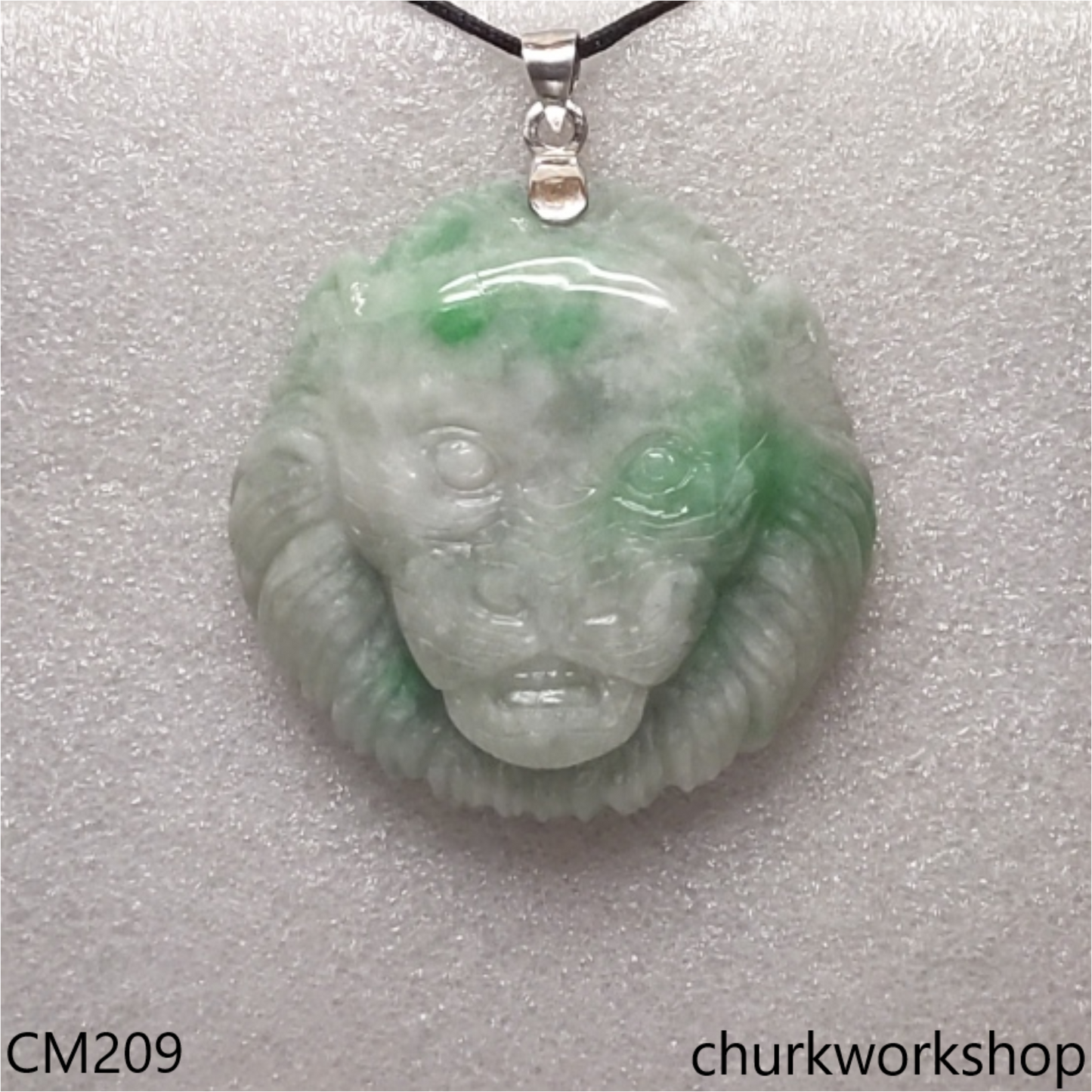Custom cut lion head jade pendant
