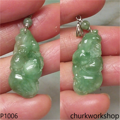Light green jade cavred pendant