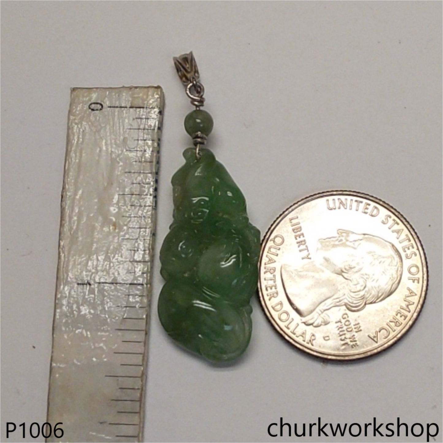 Light green jade cavred pendant