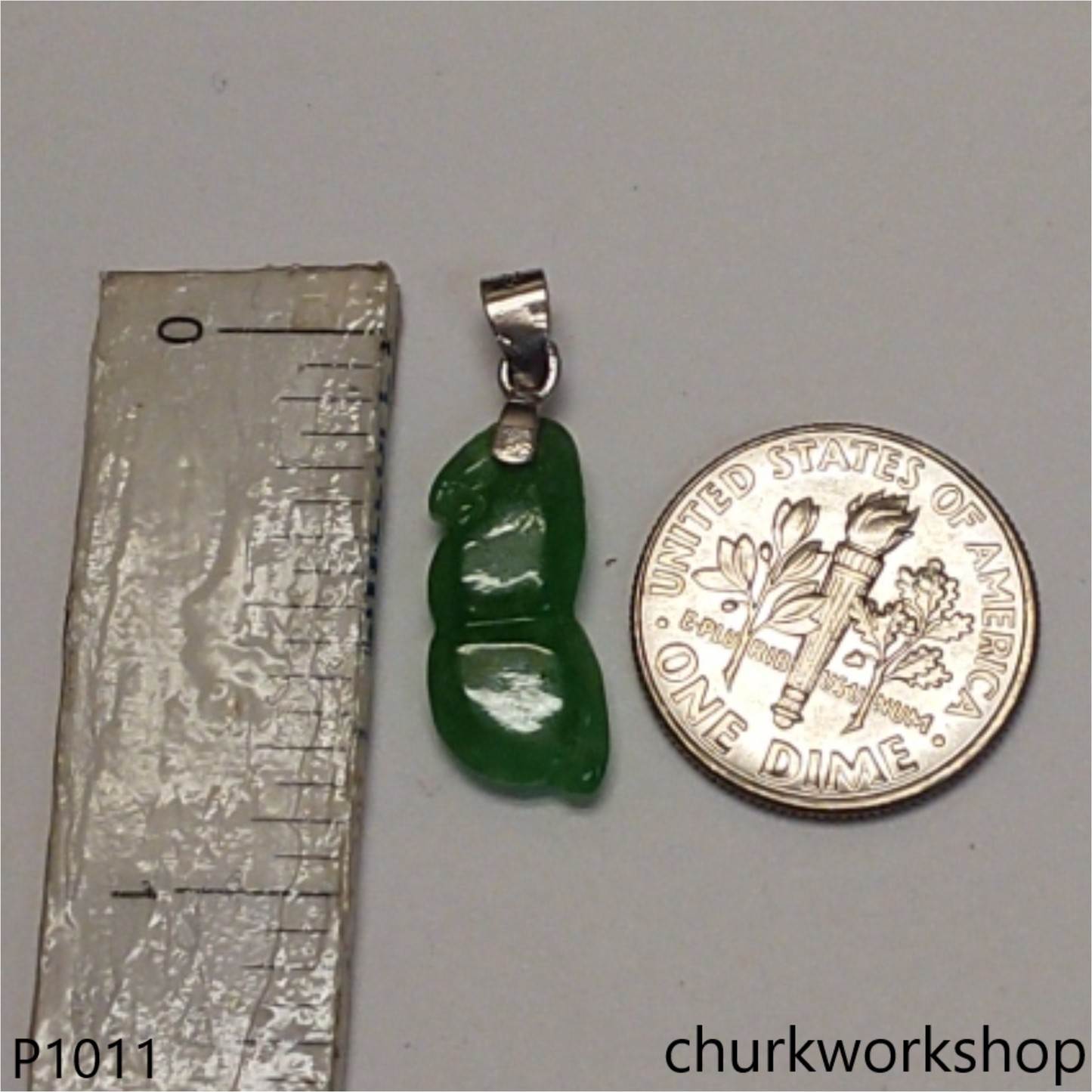 Small green jade bean pendant