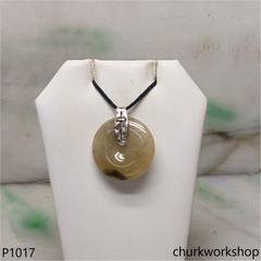 Light brownish round jade pendant