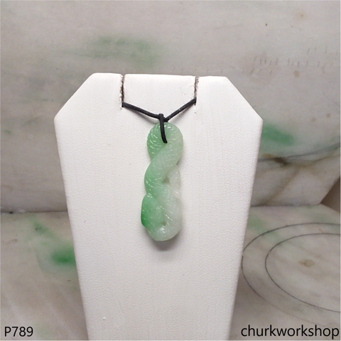 Jade snake pendant.