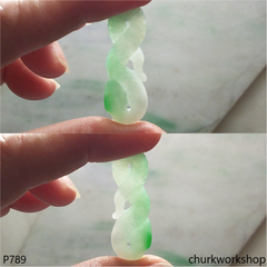Jade snake pendant.