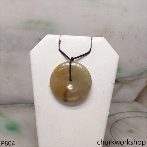 Light brownish round jade pendant