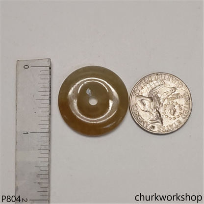 Light brownish round jade pendant