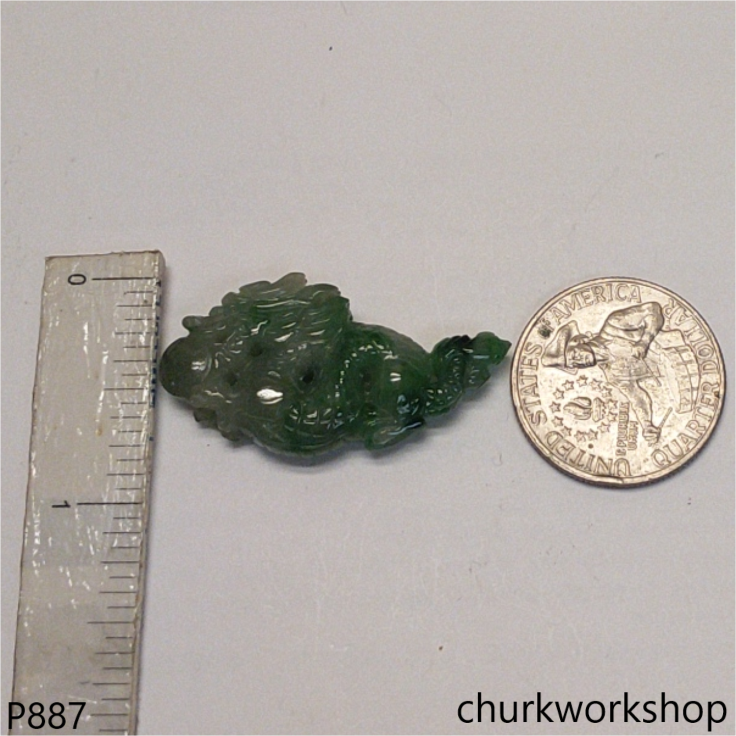 Bluish green jade dragon pendant