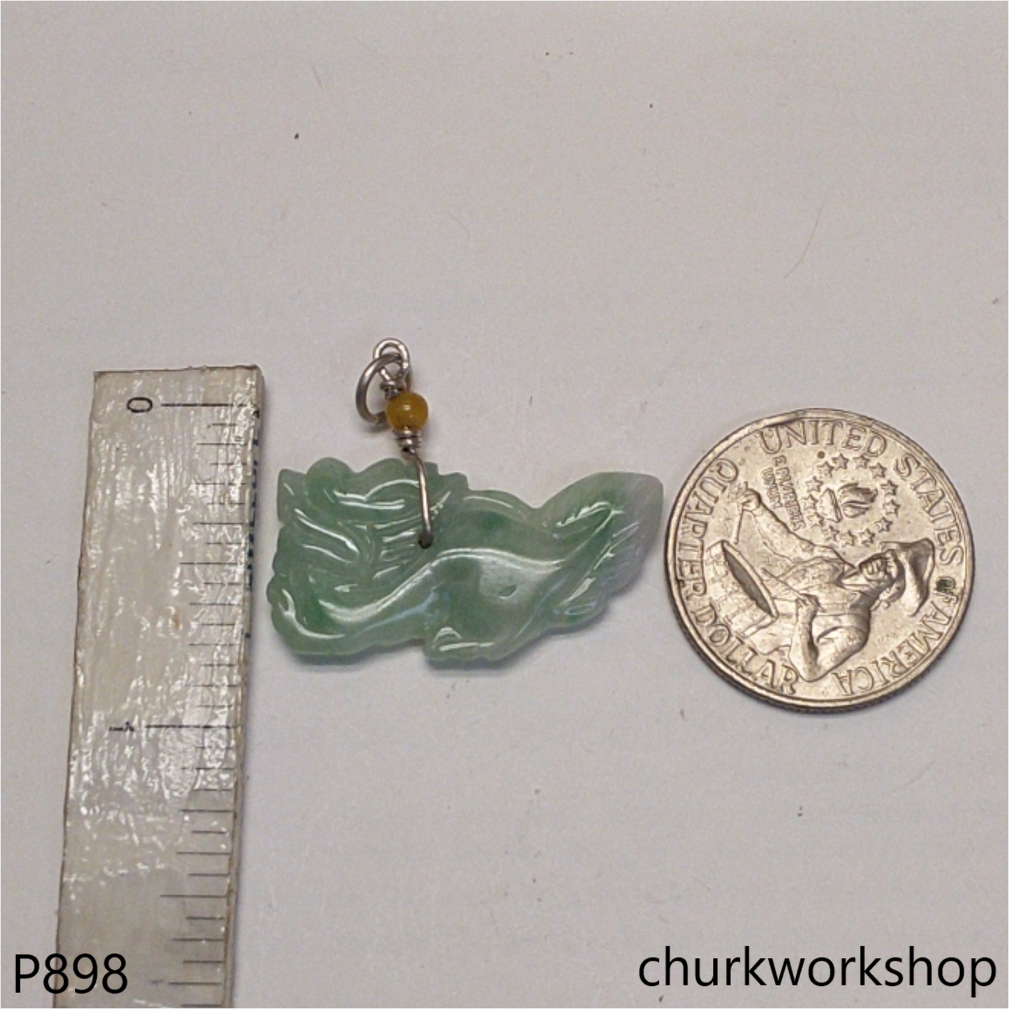 Light green jade dragon pendant