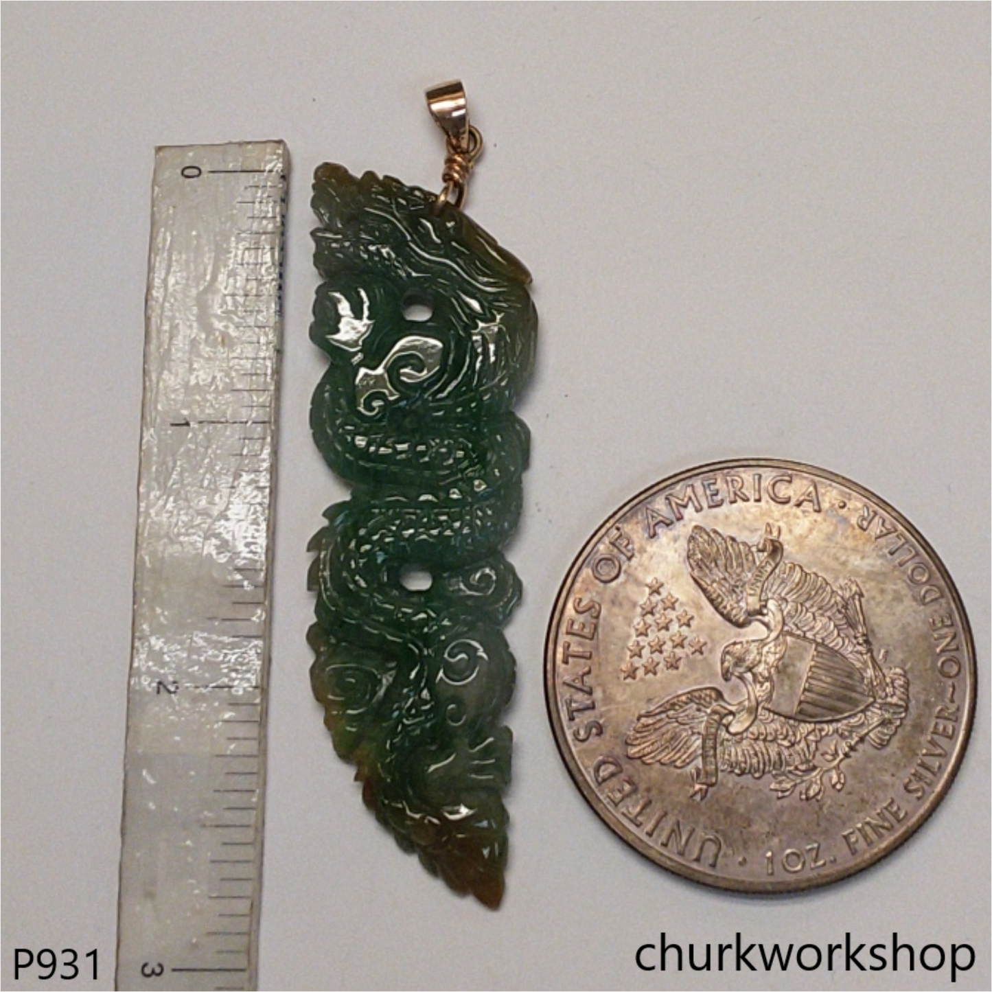 Bluish green jade dragon pendant