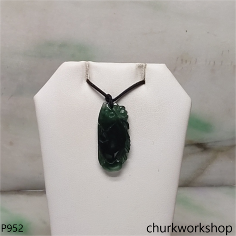 Dark green jade fish pendant