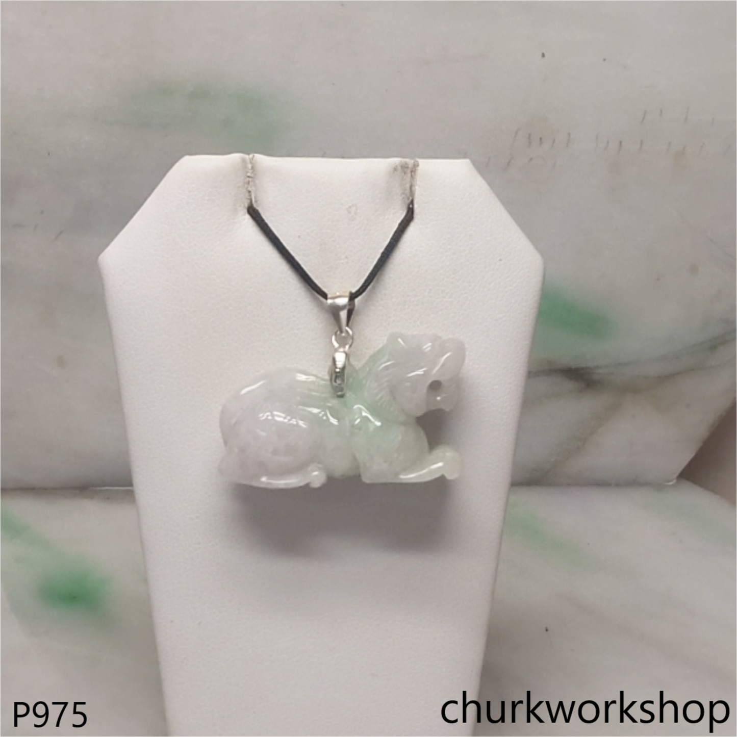 Light green jade tiger pendant