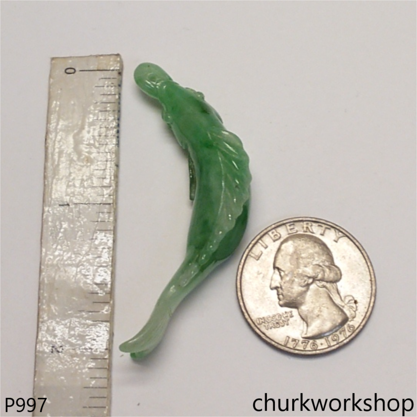 Green jade fish pendant
