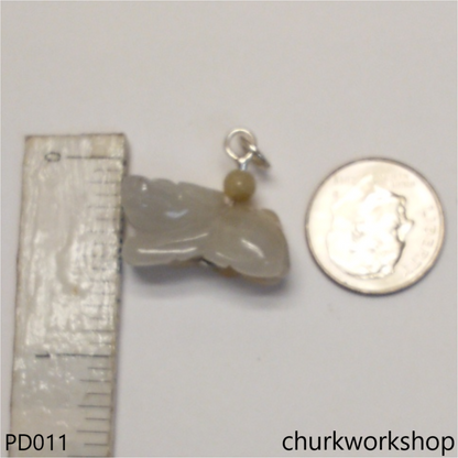 Pale yellow jade OX pendant
