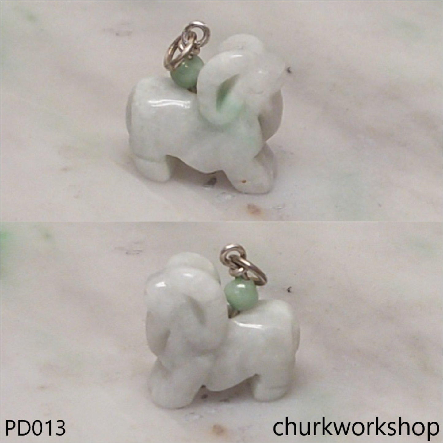 Pale green jade goat pendant