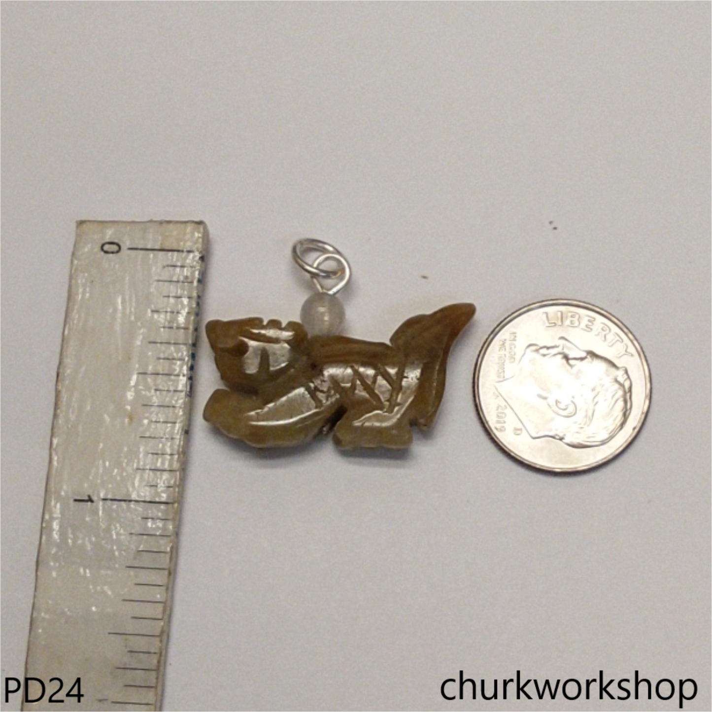 Brownish jade dragon pendant