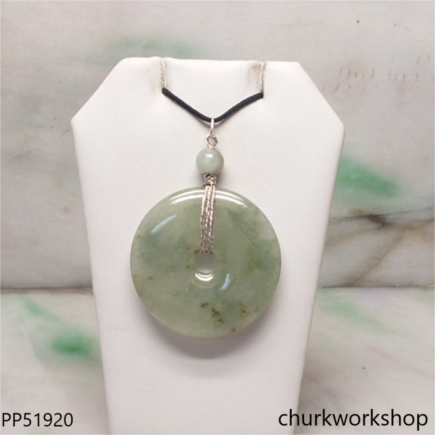 Bluish green jade Donut pendant