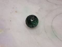 Dark green jade bead